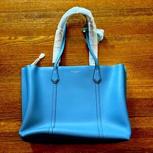 Tory Burch Pocketbook never used. Brand new.